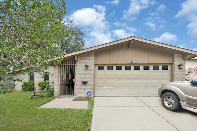 garage with concrete driveway