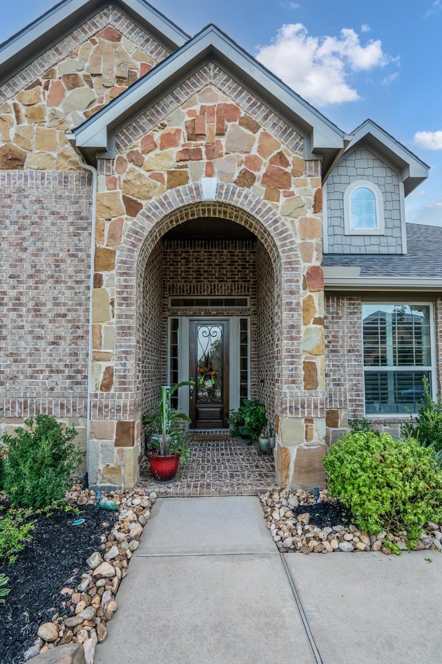 22903 Laburname Ct, Tomball, TX 77375 - doorway to property with brick siding and stone siding