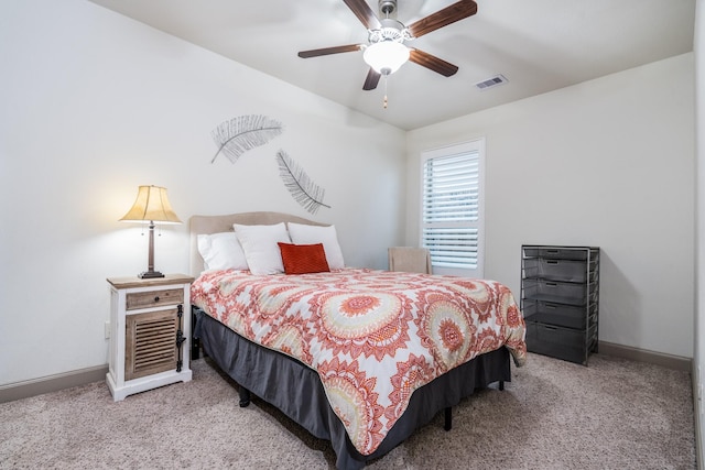 22903 Laburname Ct, Tomball, TX 77375 - carpeted bedroom with baseboards and ceiling fan