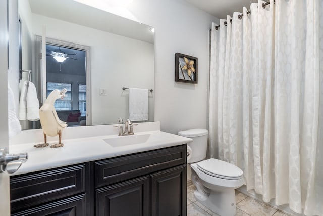 22903 Laburname Ct, Tomball, TX 77375 - full bathroom featuring vanity, toilet, tile patterned floors, and ceiling fan