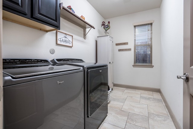 22903 Laburname Ct, Tomball, TX 77375 - clothes washing area featuring cabinet space, independent washer and dryer, and baseboards