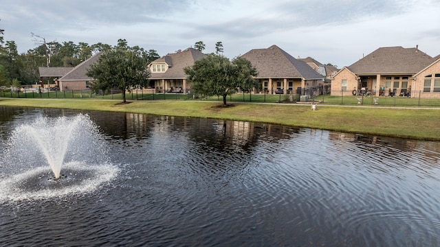 22903 Laburname Ct, Tomball, TX 77375 - water view with fence and nearby suburban area