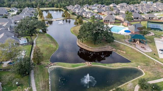 22903 Laburname Ct, Tomball, TX 77375 - view of property location featuring a large body of water, nearby suburban area, and a pool