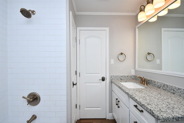 bathroom with crown molding, vanity, and tub / shower combination