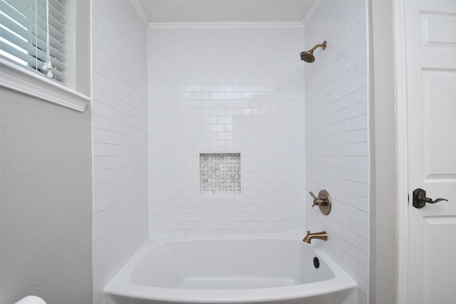bathroom featuring bathtub / shower combination and ornamental molding