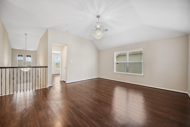 18230 Russett Green Dr, Tomball, TX 77377 - unfurnished room featuring a chandelier, wood finished floors, lofted ceiling, and baseboards