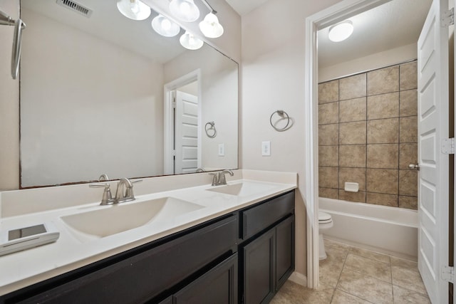 18230 Russett Green Dr, Tomball, TX 77377 - bathroom featuring toilet, double vanity, shower / washtub combination, and tile patterned flooring