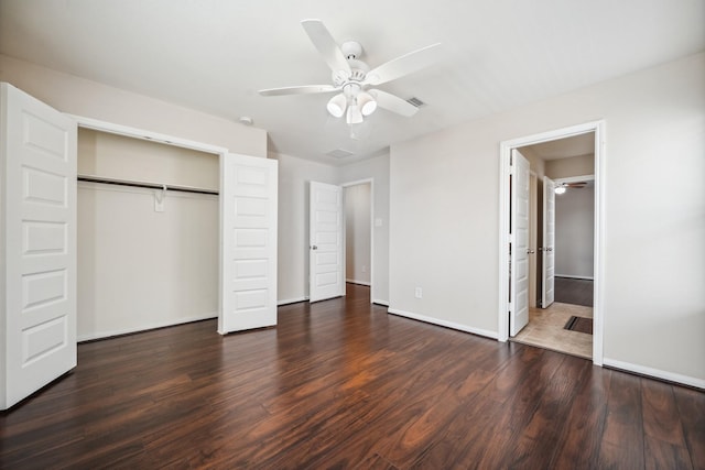 18230 Russett Green Dr, Tomball, TX 77377 - unfurnished bedroom featuring wood finished floors, a closet, baseboards, and ceiling fan