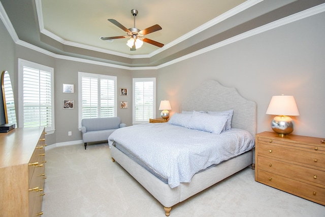 5006 Isidore Ln, Missouri City, TX 77459 - bedroom with light carpet, a tray ceiling, ornamental molding, and ceiling fan