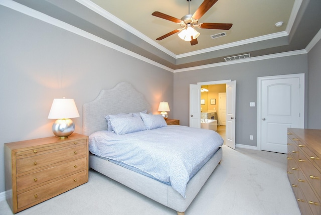 5006 Isidore Ln, Missouri City, TX 77459 - bedroom with a raised ceiling, light colored carpet, crown molding, baseboards, and ensuite bathroom