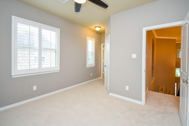 5006 Isidore Ln, Missouri City, TX 77459 - carpeted spare room with ceiling fan and baseboards