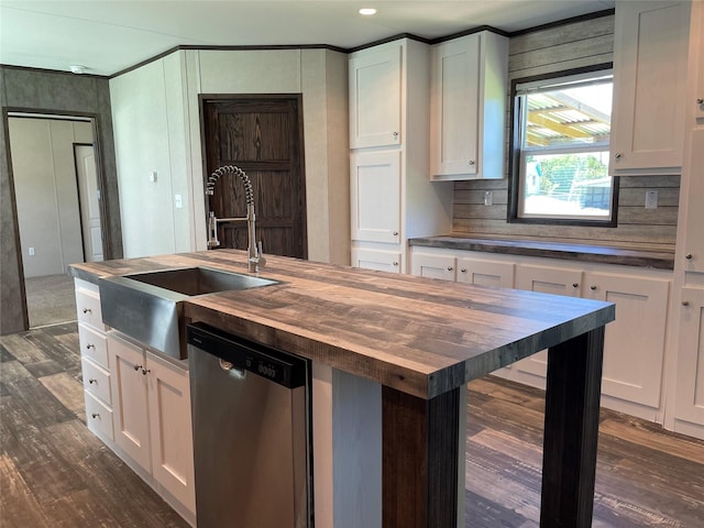 322 E College St, Fairfield, TX 75840 - kitchen with butcher block counters, dishwasher, a sink, dark wood-type flooring, and recessed lighting