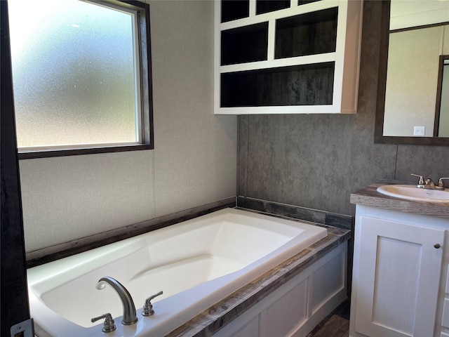 322 E College St, Fairfield, TX 75840 - full bathroom featuring vanity and a garden tub