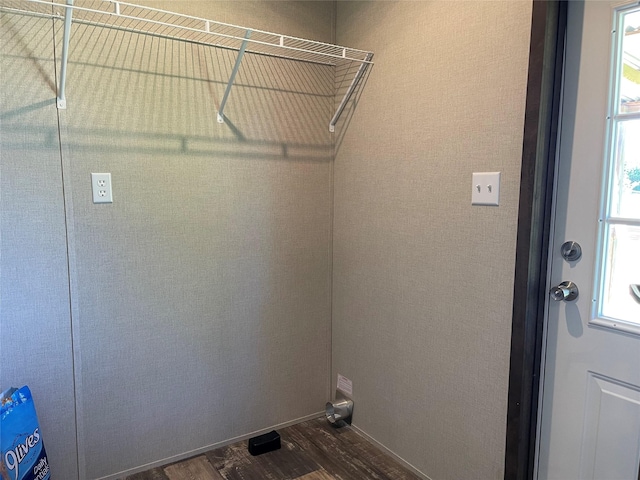 322 E College St, Fairfield, TX 75840 - laundry area with dark wood finished floors