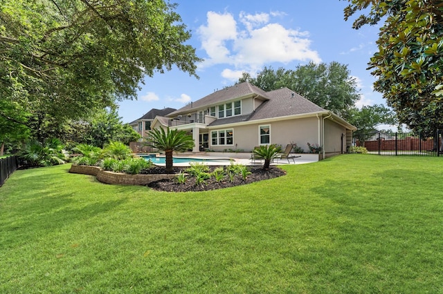 back of house featuring a patio area and stucco siding