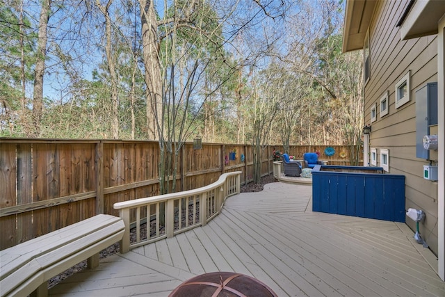 70 Harvest Wind Pl, The Woodlands, TX 77382 - deck featuring a fenced backyard and outdoor lounge area