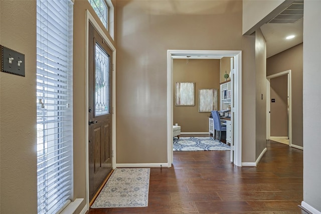 70 Harvest Wind Pl, The Woodlands, TX 77382 - entrance foyer featuring hardwood / wood-style flooring and baseboards