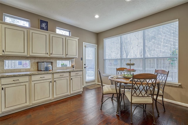 70 Harvest Wind Pl, The Woodlands, TX 77382 - dining space featuring baseboards, recessed lighting, dark wood finished floors, and a textured ceiling