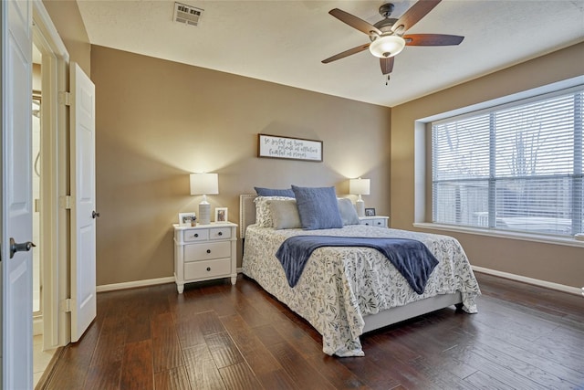 70 Harvest Wind Pl, The Woodlands, TX 77382 - bedroom featuring baseboards, dark wood-style flooring, and ceiling fan