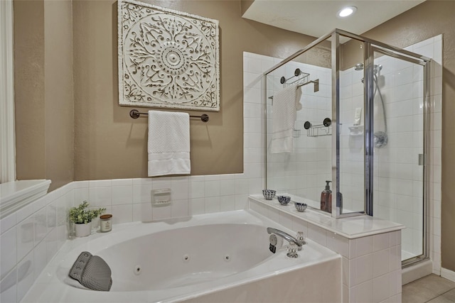 70 Harvest Wind Pl, The Woodlands, TX 77382 - full bath featuring a shower stall and a jetted tub