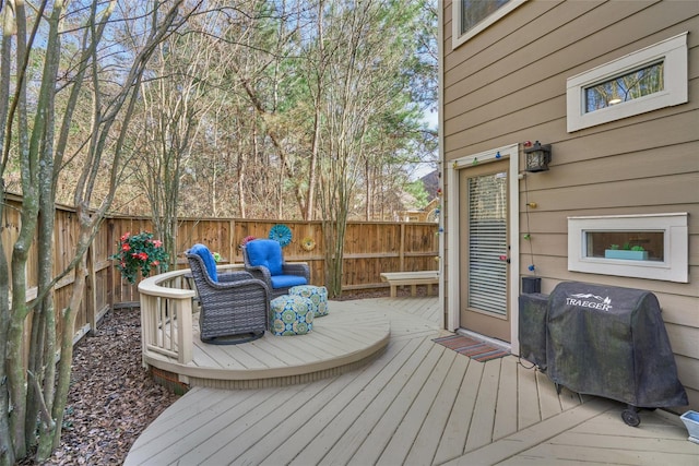 70 Harvest Wind Pl, The Woodlands, TX 77382 - wooden terrace featuring a fenced backyard and a grill