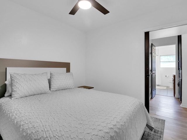 507 Patricia, San Antonio, TX 78216 - bedroom featuring wood finished floors, a ceiling fan, and ensuite bathroom