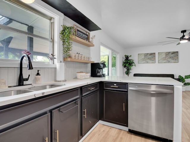 507 Patricia, San Antonio, TX 78216 - kitchen featuring dishwasher, a sink, light wood finished floors, and open shelves