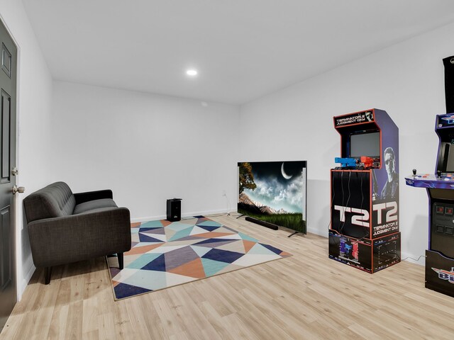 507 Patricia, San Antonio, TX 78216 - playroom featuring wood finished floors, baseboards, and recessed lighting
