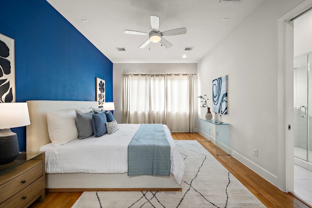 2705 St Emanuel St, Houston, TX 77004 - bedroom with wood finished floors, baseboards, and ceiling fan