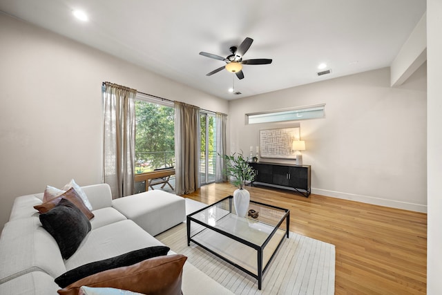 2705 St Emanuel St, Houston, TX 77004 - living room with baseboards, wood finished floors, ceiling fan, and recessed lighting