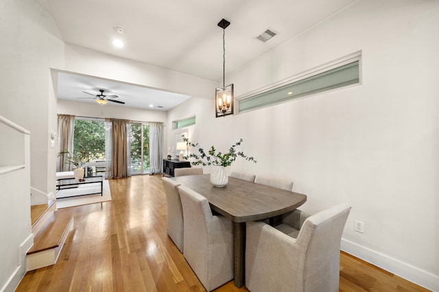 2705 St Emanuel St, Houston, TX 77004 - dining area featuring light wood-type flooring, ceiling fan, and baseboards