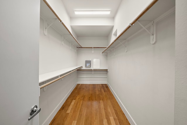 2705 St Emanuel St, Houston, TX 77004 - walk in closet featuring light wood finished floors and electric panel