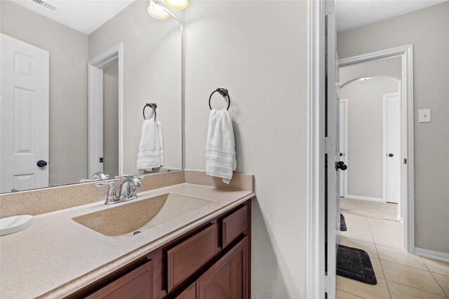22726 Little Blue Stem Dr, Tomball, TX 77375 - bathroom featuring tile patterned flooring and vanity