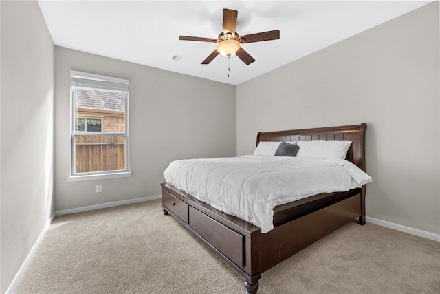 22726 Little Blue Stem Dr, Tomball, TX 77375 - carpeted bedroom with visible vents, baseboards, and a ceiling fan