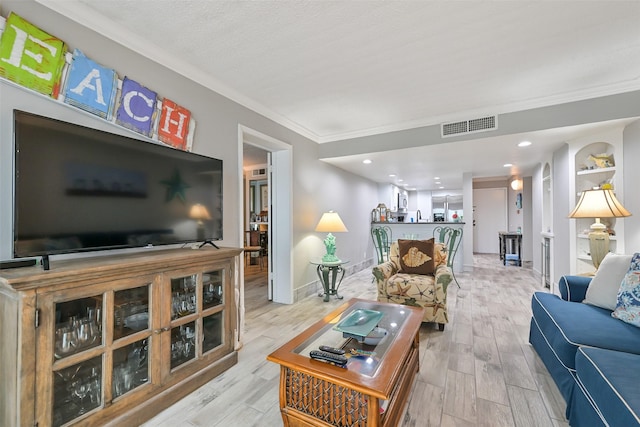 7310 Seawall Blvd Unit 902/903, Galveston, TX 77551 - living room with crown molding, light wood-style floors, and baseboards