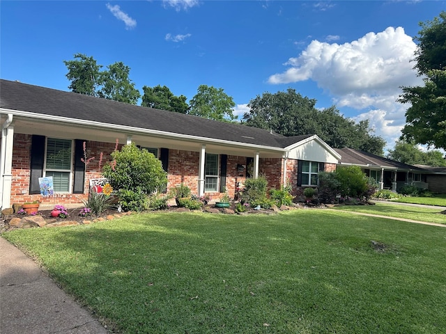 11107 Atwell Dr, Houston, TX 77096 - single story home with brick siding, a front lawn, and covered porch