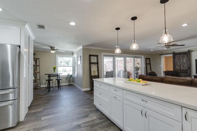 11107 Atwell Dr, Houston, TX 77096 - kitchen with freestanding refrigerator, a ceiling fan, recessed lighting, baseboards, and ornamental molding
