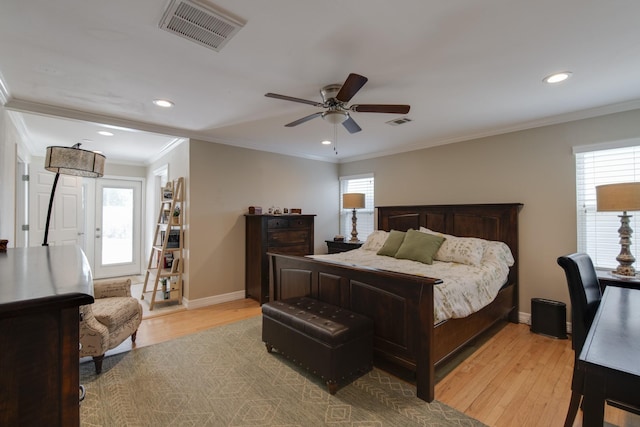 11107 Atwell Dr, Houston, TX 77096 - bedroom with light wood-style flooring, recessed lighting, baseboards, crown molding, and a ceiling fan