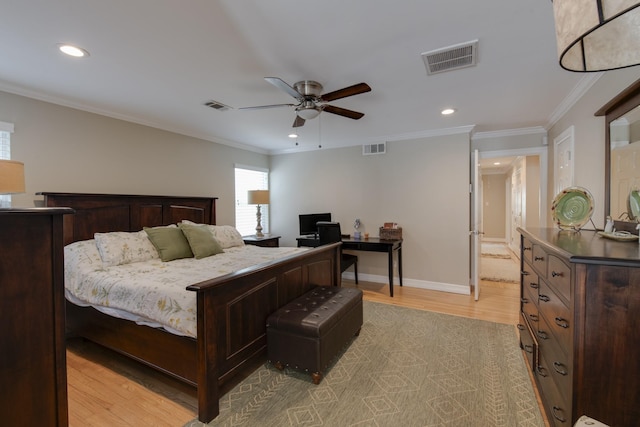 11107 Atwell Dr, Houston, TX 77096 - bedroom featuring a desk, light wood-style flooring, recessed lighting, crown molding, and a ceiling fan