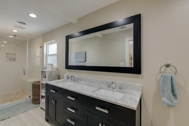 11107 Atwell Dr, Houston, TX 77096 - bathroom with a shower stall, double vanity, and tile patterned floors