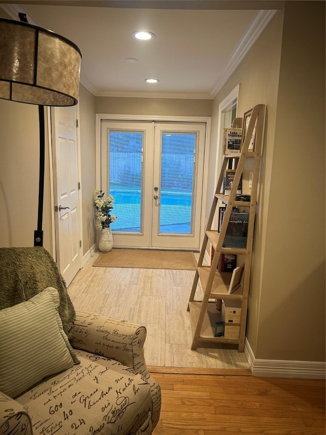 11107 Atwell Dr, Houston, TX 77096 - doorway featuring french doors, baseboards, crown molding, hardwood / wood-style flooring, and recessed lighting