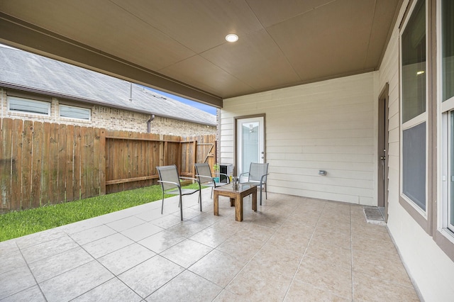 view of patio / terrace with fence