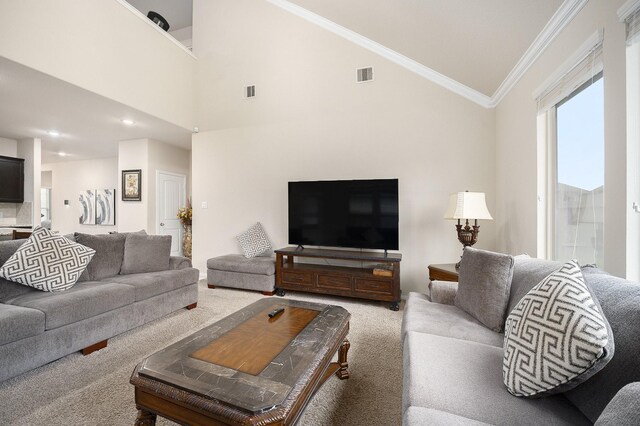 living room featuring lofted ceiling, light carpet, and crown molding
