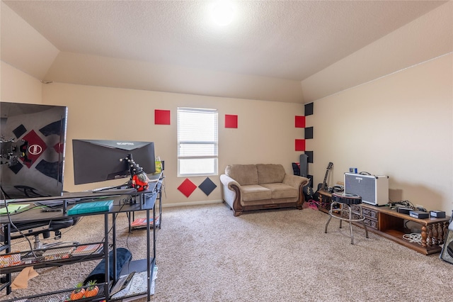game room with carpet, vaulted ceiling, and an office area