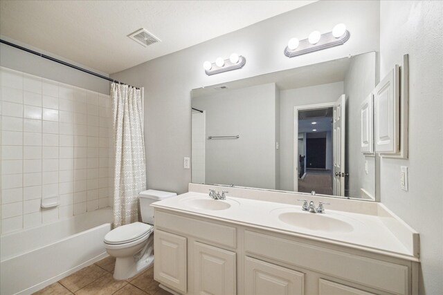 bathroom with tile patterned flooring, toilet, shower / bath combination with curtain, and double vanity
