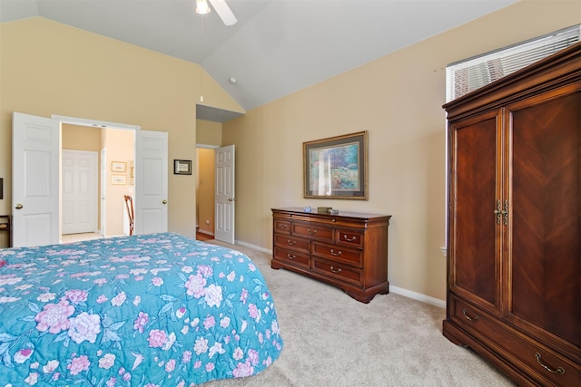 bedroom featuring vaulted ceiling, light carpet, baseboards, and ceiling fan