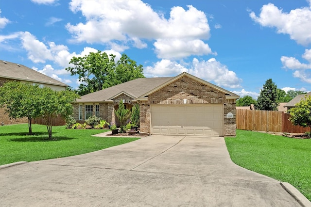 13228 Miller Ln, Willis, TX 77318 - ranch-style house with concrete driveway, brick siding, and an attached garage