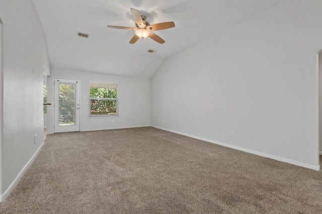 13228 Miller Ln, Willis, TX 77318 - unfurnished room featuring carpet, a ceiling fan, lofted ceiling, and baseboards