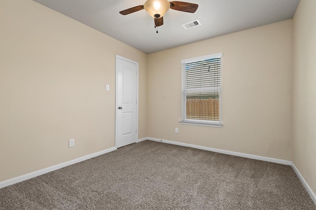 13228 Miller Ln, Willis, TX 77318 - empty room with carpet, ceiling fan, and baseboards