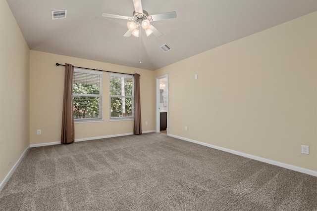13228 Miller Ln, Willis, TX 77318 - empty room featuring carpet flooring, ceiling fan, vaulted ceiling, and baseboards